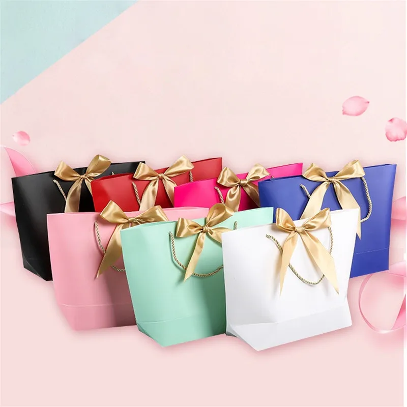 

100Pcs Present Box For Pajamas Clothes Books Packaging Gold Handle Paper Box Bags Kraft Paper Gift Bag With Handles 28x9x20cm