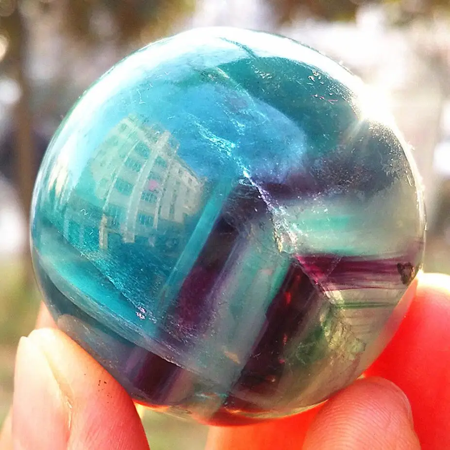 

40mm Natural and beautiful colored fluorite ball