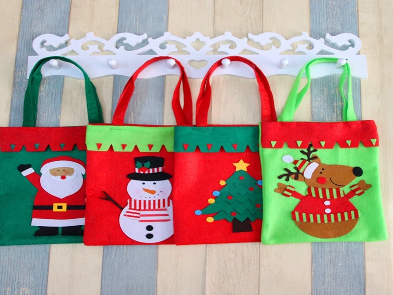 

20pcs/lot Fast shipping Creative Santa Claus Handle Sack Christmas Gift Bag Decoration 4 styles