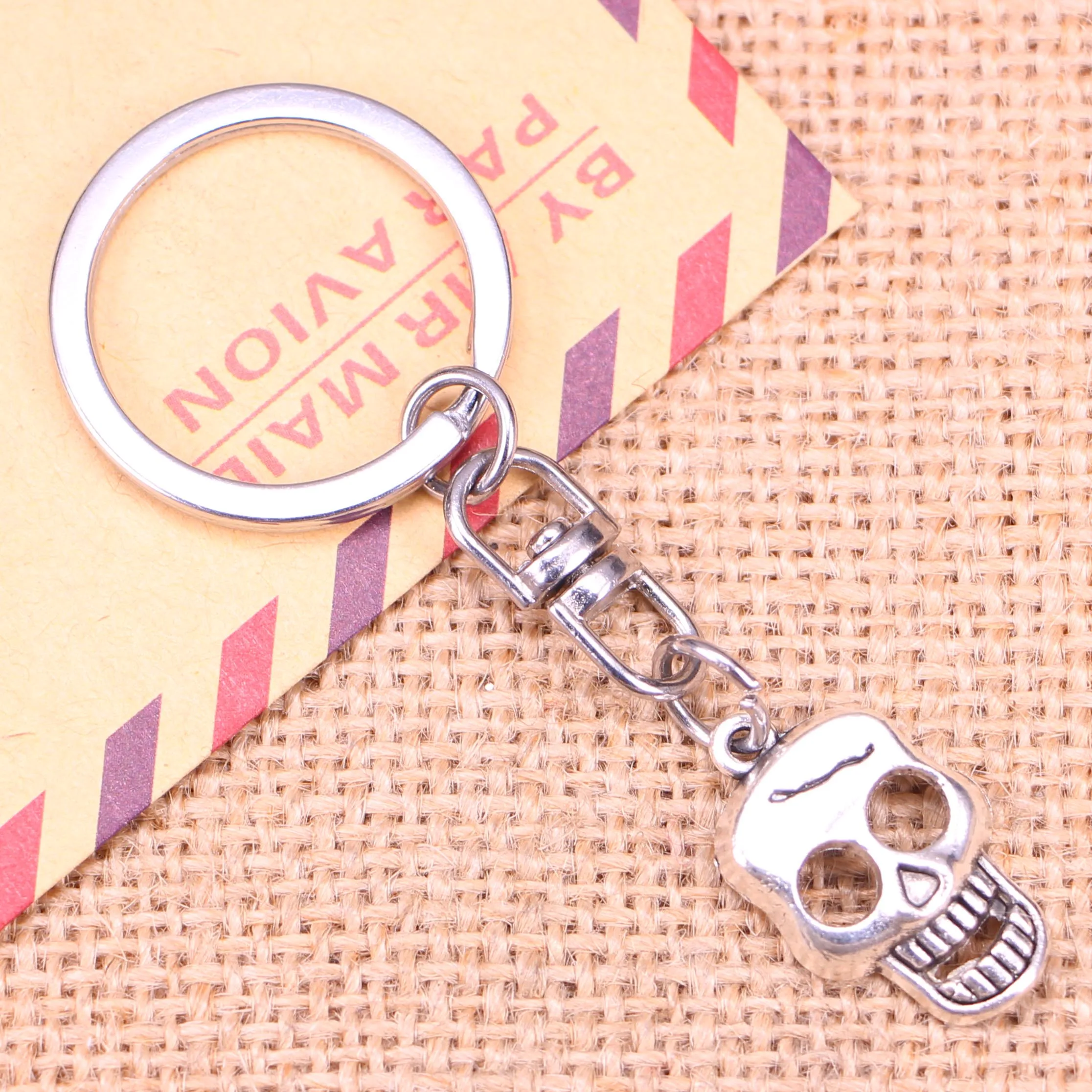 20pcs New Fashion Keychain 23x12mm skeleton skull Pendants DIY Men Jewelry Car Key Chain Ring Holder Souvenir For Gift