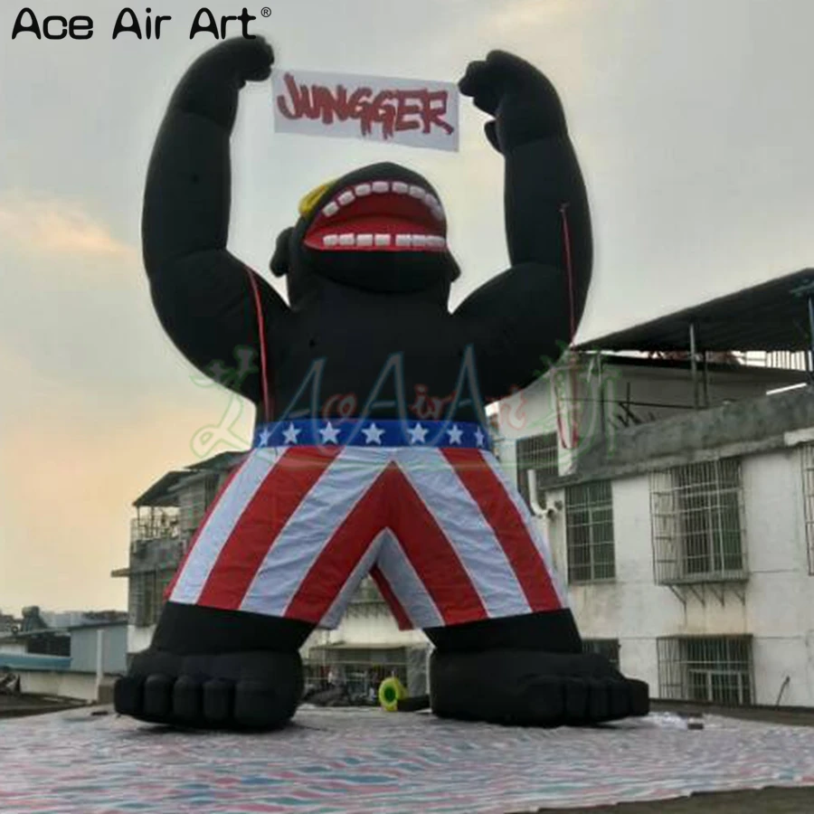 

6m High Giant Black Animal Model Standing Inflatable Gorilla with Banner in Hands for Advertising on France