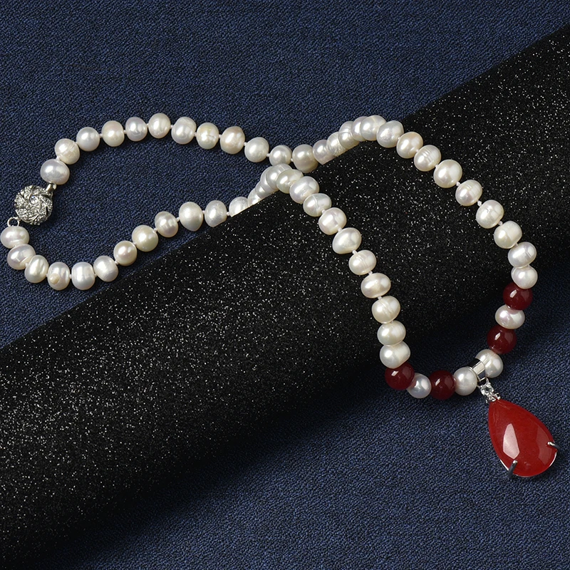 The 8-9 mm water Natural Pearl Necklace  with Four translucent red balls connected with a bright red droplet 16*26*8 mm Pend