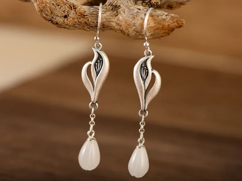 

100%S925 sterling silver retro female models and Tian Yu white magnolia tassel earrings free shipping