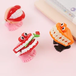 1PCS Toys on The Chain Jumped Four Paragraph Styles Teeth Random Friends Juguetes