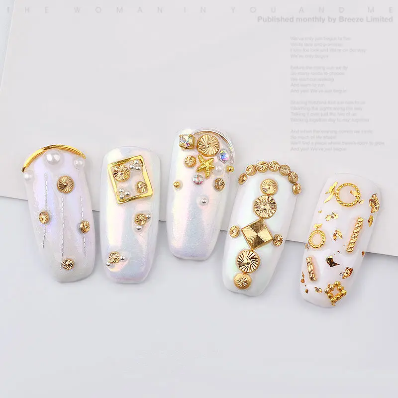 100 pz/lotto in lega 3D Nail Art oro spirale modello rivetti borchie Manicure in metallo accessori per Nail Art Charms decorazione unghie fai da te