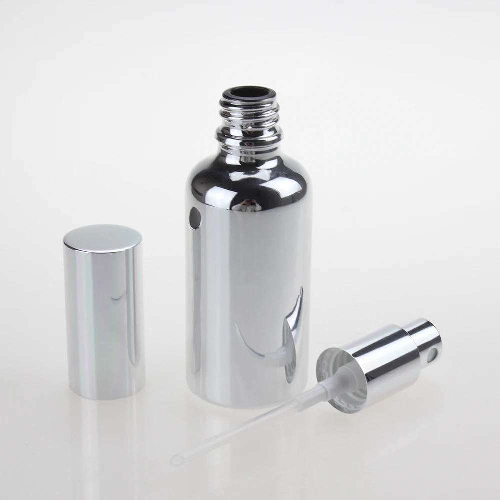 30ml glass round lotion pump bottle for sale,1 oz cream shiny silver and gold glass bottle