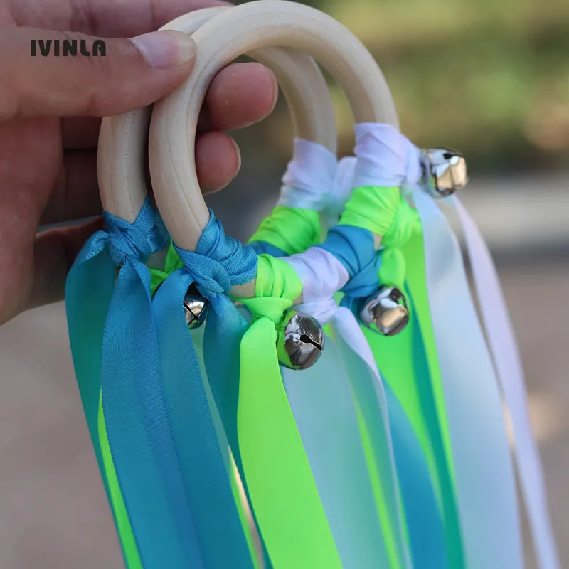 

20pcs/lot Lemon Green Wooden Ring Waldorf Ribbon With Bell Hand Kite Toy FLY ME Birthday Party Favors