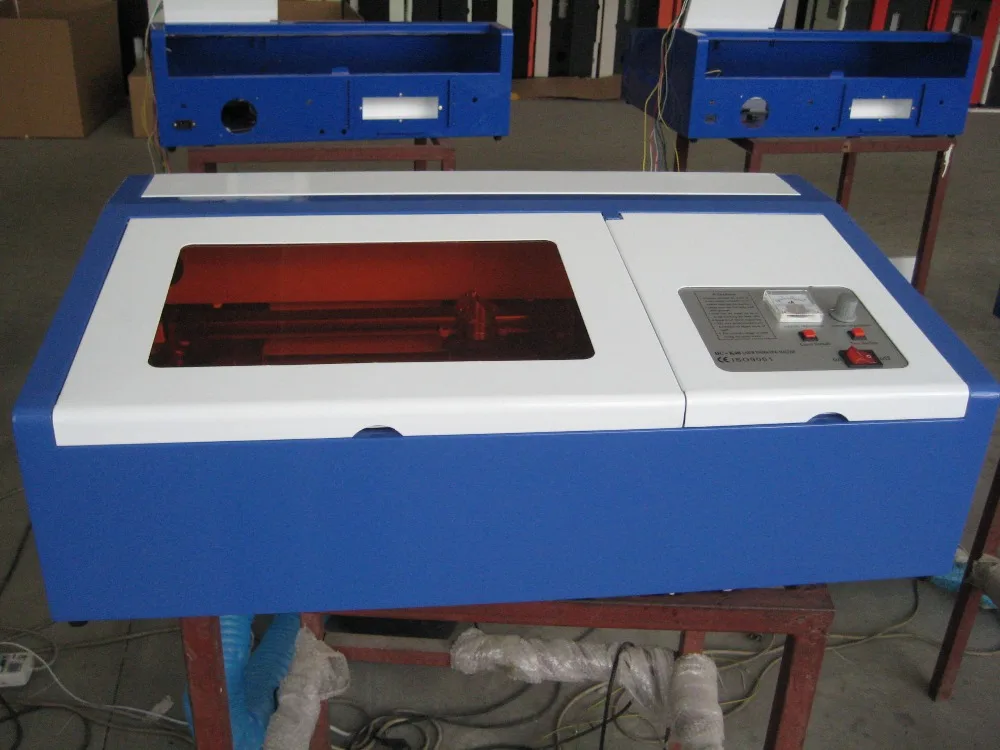 Mini 40 w co2 laser cutter shenhui laser macchina per incisione timbro incisione xilografica prezzo della macchina