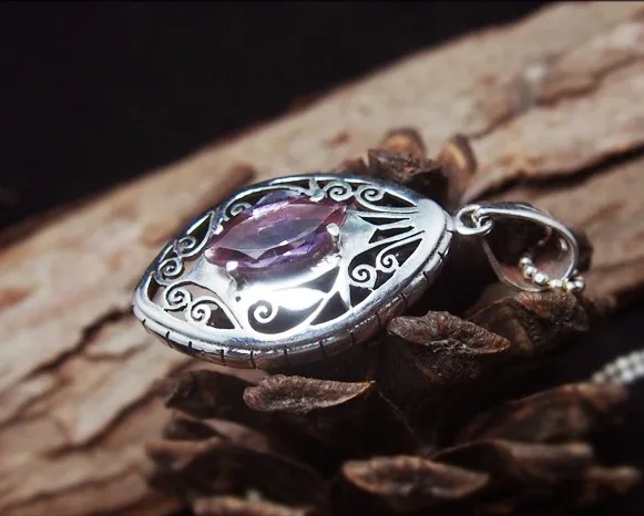 Nepal. Elegant and noble natural amethyst. 925 Silver Hand-carved Delicate Pendant