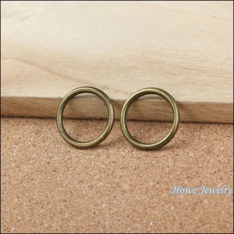 

Wholesale vintage 140pcs antique bronze jump rings pendant charm diy jewelry Findings 14.5mm hole dia 10091