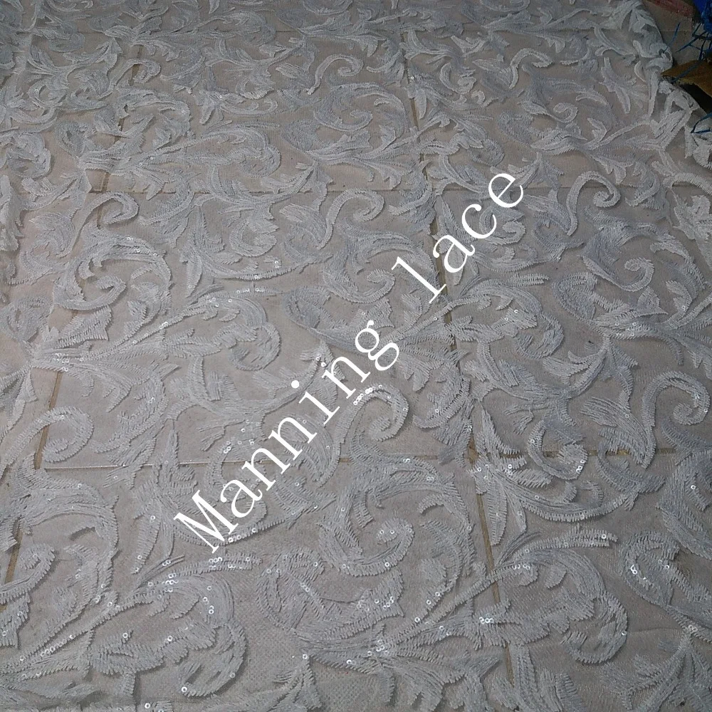 New design Embroidered lace fabric with sweet and elegant wedding lace fabric, high quality embroidered veil fabric.