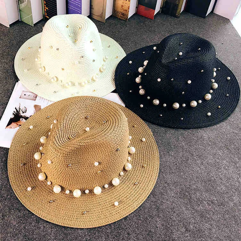 2019 New Summer British pearl beading flat brimmed straw hat Shading sun hat Lady beach hat Sunscreen fashion jazz cap