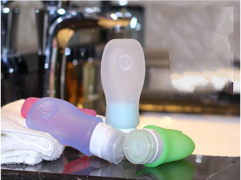 100 pcs/lot Top Quality Portable Mini Silicone Bottle Travel Lotion Points Shampoo Container