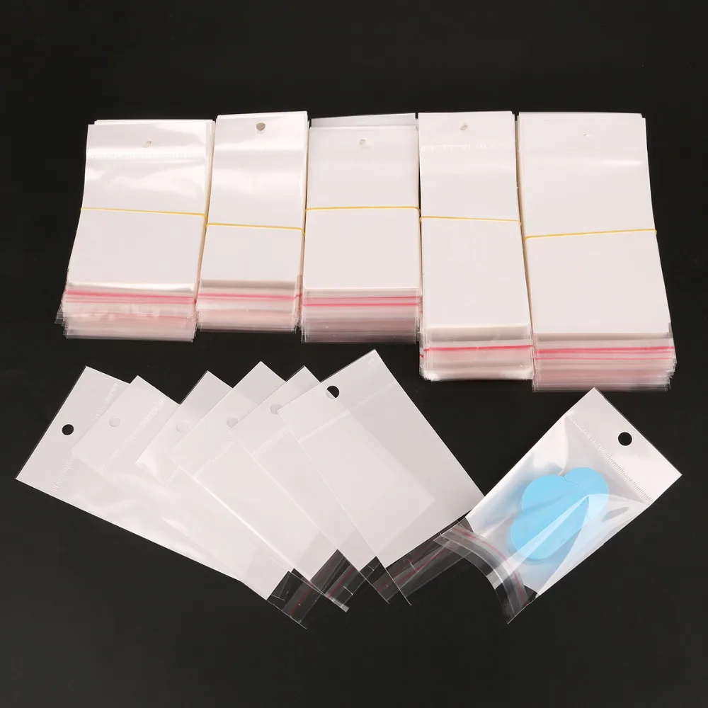 

100pcs/pack Size 6x14cm/7x14cm/8x14cm/6x17.5cm White/Clear Self-Adhesive Plastic Storage Bag For Jewelry Packaging Gift Bag