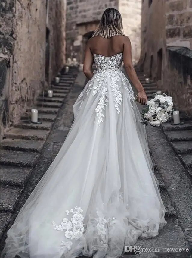 2021 Beach Wedding Dresses Sweetheart Lace Appliques Princess Backless Bridal Gowns Backless Country Boho A-Line Wedding Dress