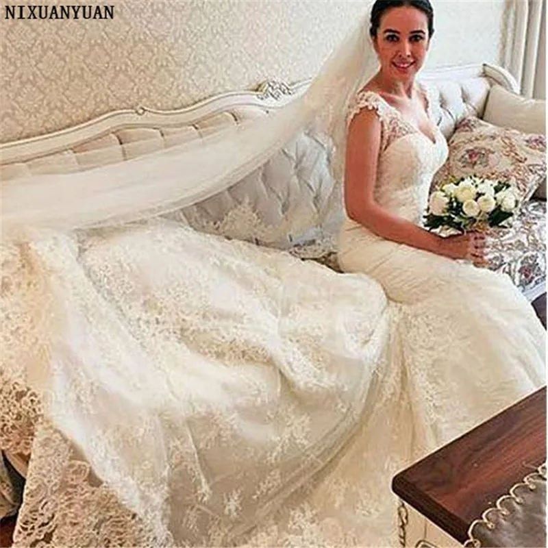 فساتين زفاف بدون ظهر موضة 2023 Vestido De Noiva فساتين زفاف بدون ظهر بتصميم حورية البحر على شكل حرف v Vestido De Noiva وأكمام قصيرة دانتيل بوهو فستان زفاف عربي دبي