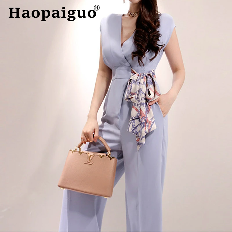 

2022 Summer Female Large Size Solid Elegant Loose V-neck Short Sleeve Jumpsuit Trousers Women Casual Long Pants with Sashes