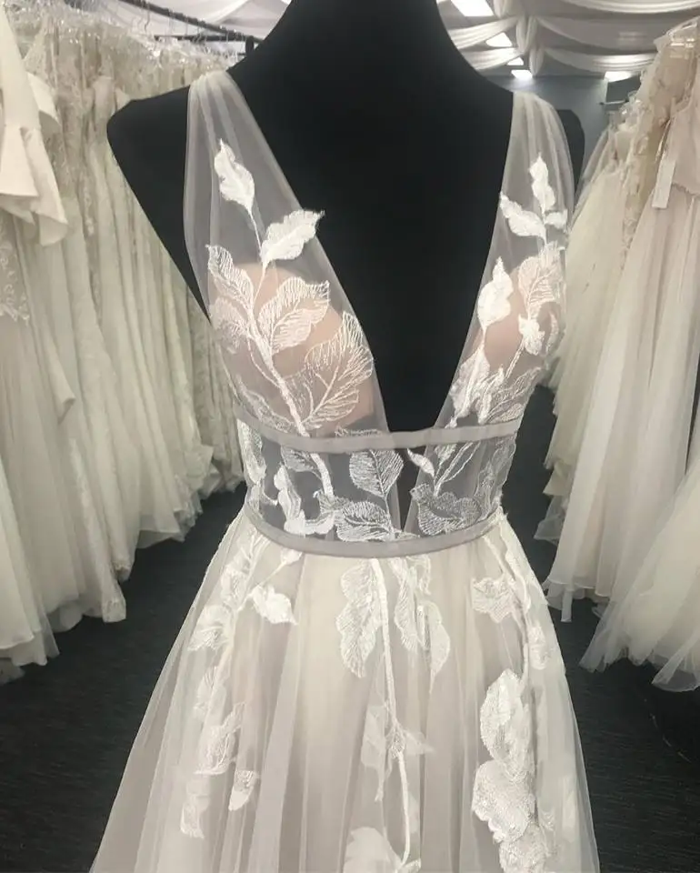 Boho Trouwjurken 2019 Zomer Bohemian vestido de novia A Line Diepe V-hals Backless Strand robe de mariee Illusion sweep Trein