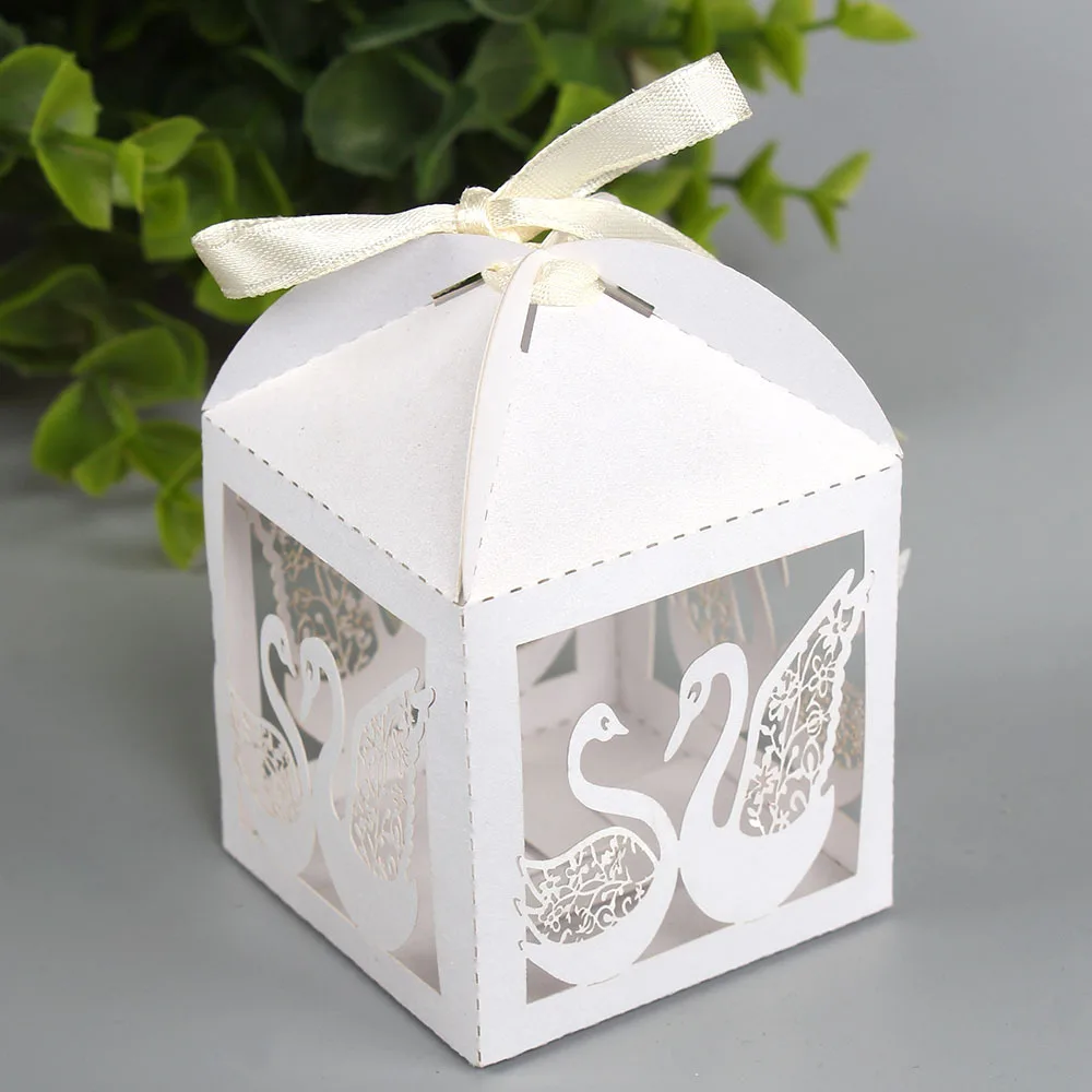 

Free shipping Hollow laser Swan Candy BOX Gift Boxes Wedding Party Favor Decoration With Ribbon 50/100PCS/lot