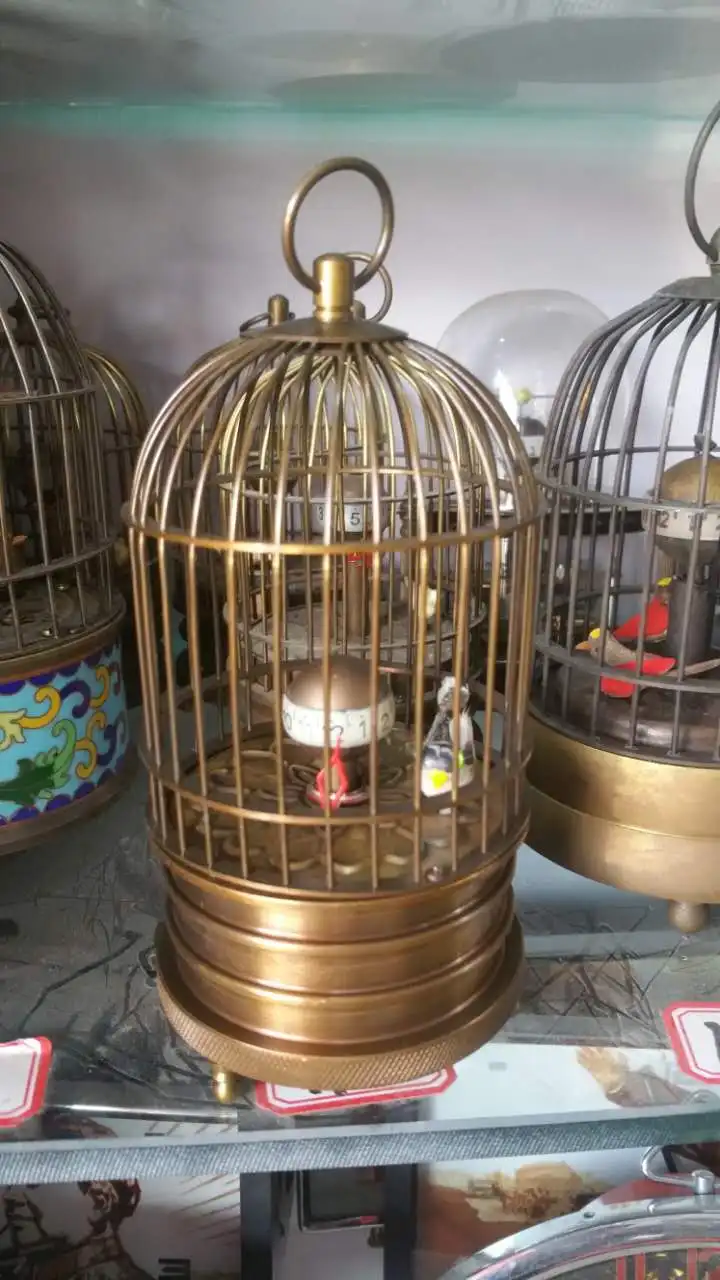 

Exquisite Interesting Chinese brass birdcage machine clock with bird inside