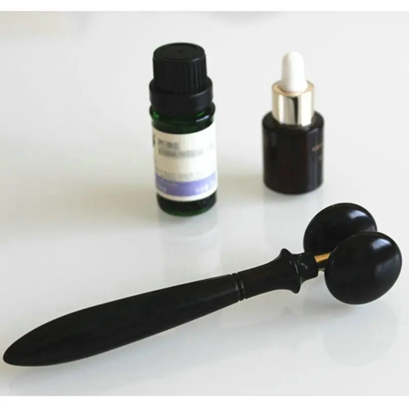 Ebony facial eye massager finger massager wheel roller activity joint meridian acupressure
