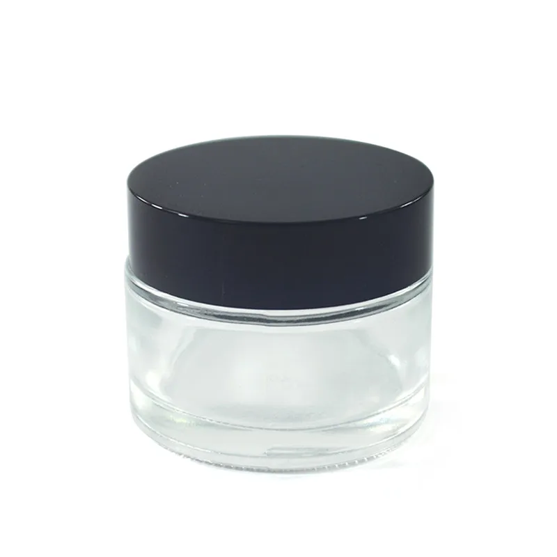 

100pcs*30g glass cosmetic jar cosmetic packaging clear glass cream jar with black aluminum lid 1oz glass cosmetic container