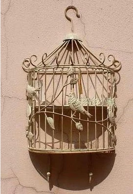 The birds in the forest Do old, wrought iron Bird cages hanging wall act the role ofing The racks hook Two color