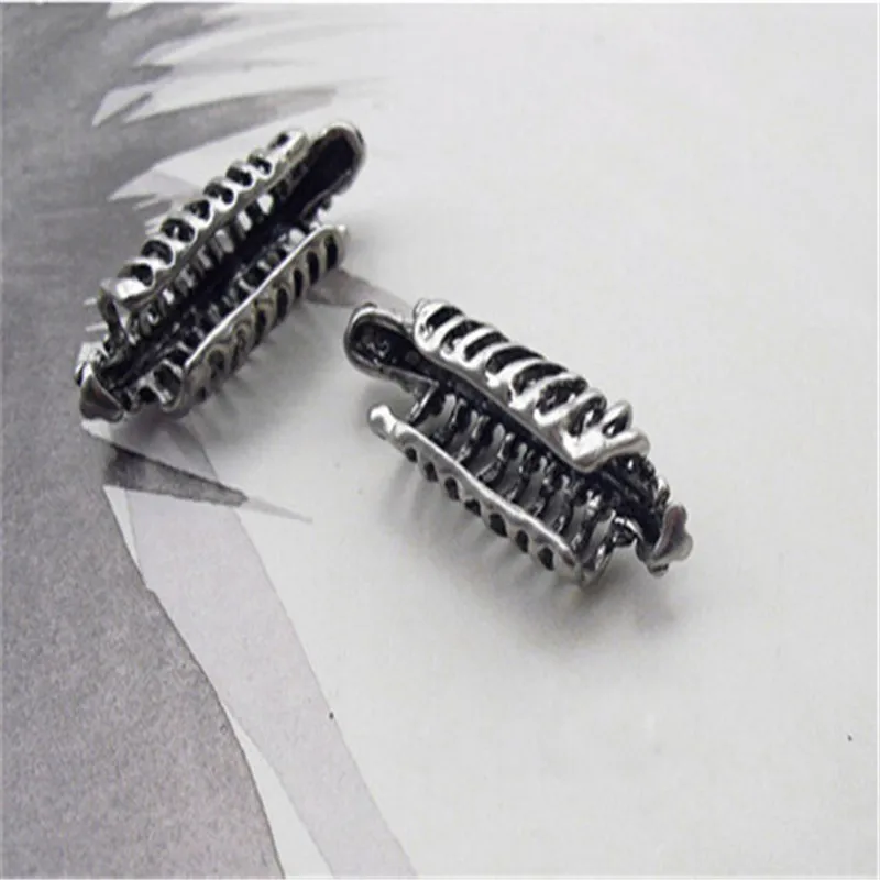 New punk wind cool skeleton spine ear clip ear studs men and women without earrings earrings jewelry wholesale