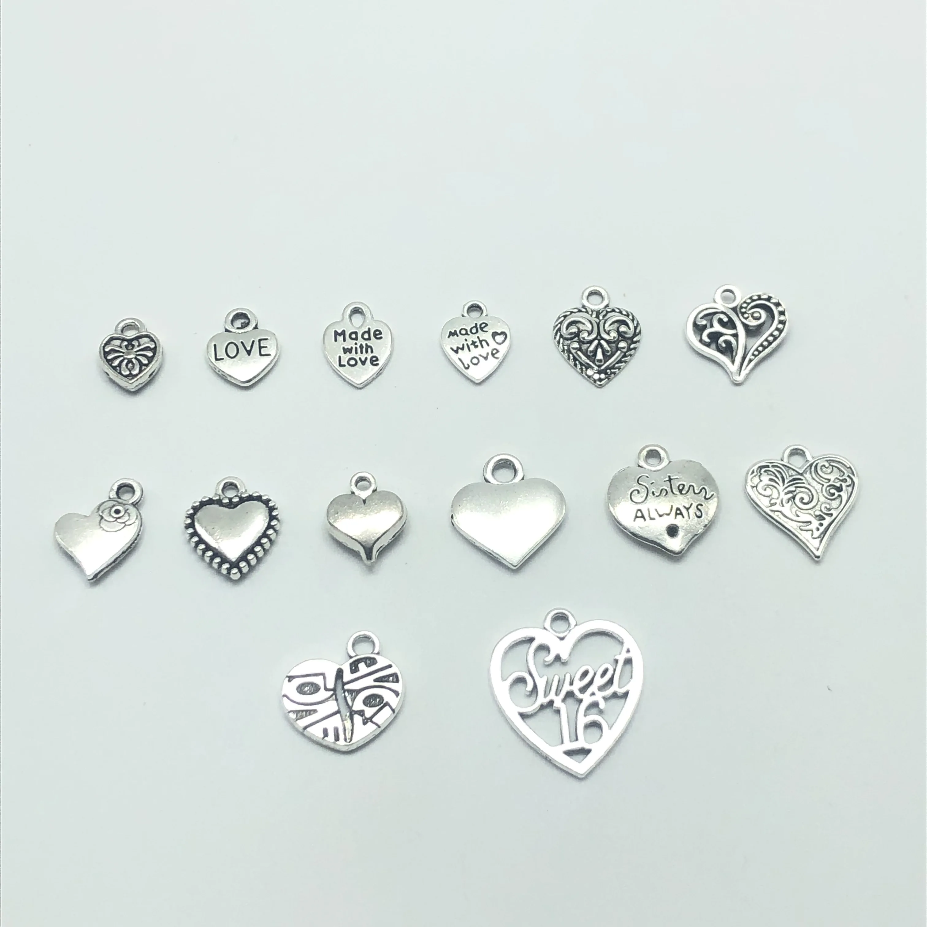 JunKang 30pcs Mixed batch Alloy Tibetan silver heart jewelry charm pendant classic DIY fashion findings