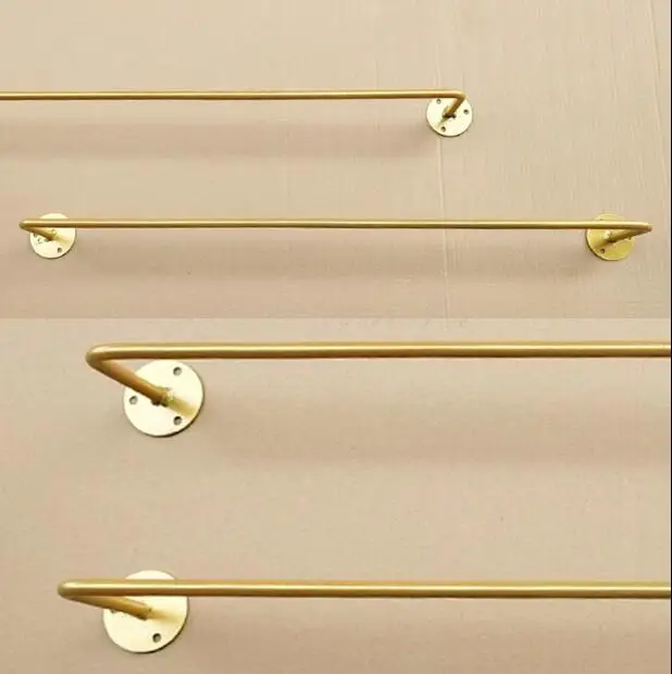 Gold clothing store display rack wall - mounted thin tube clothes rack