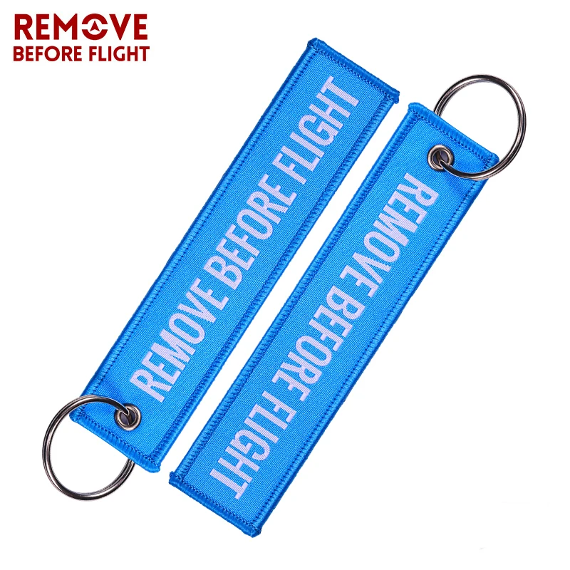 

Wholesale 20 PCS Remove Before Flight Woven Key Tag Special Key Tag Label Blue Chain Keychain for Aviation Gifts OEM Keychains