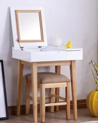 Dressing table. Paint white makeup table. The bedroom covers the makeup table