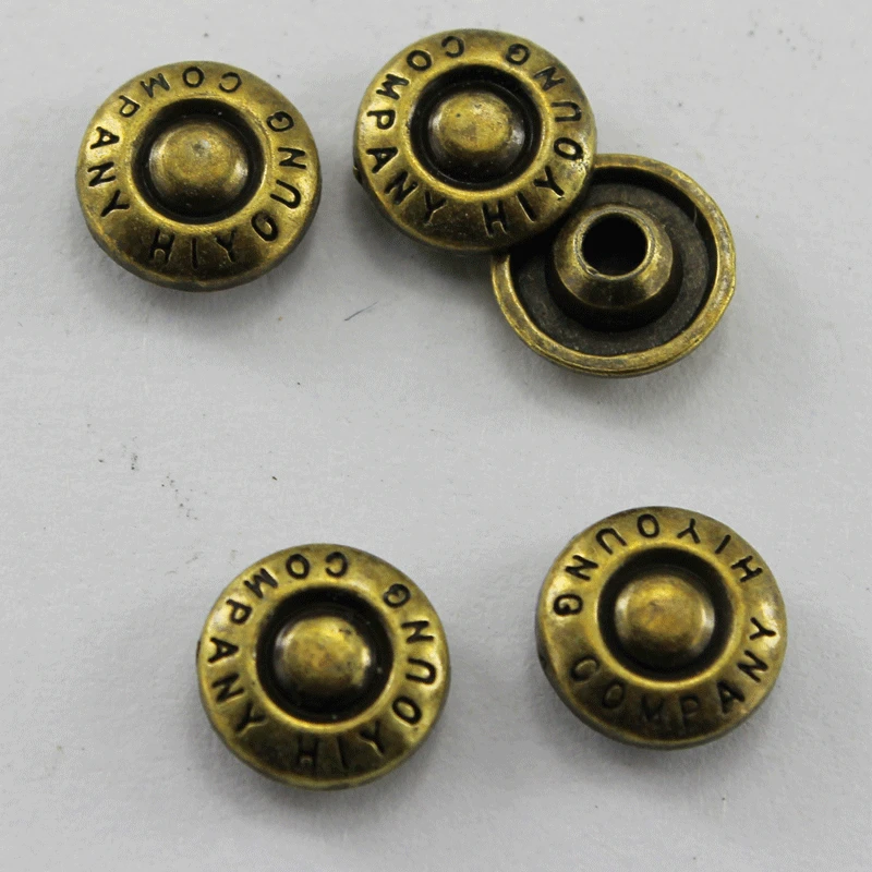 

(1000pcs/pack) Customized electroplating copper metal Rivets with embossed logo brand name for jackets and jeans buttons