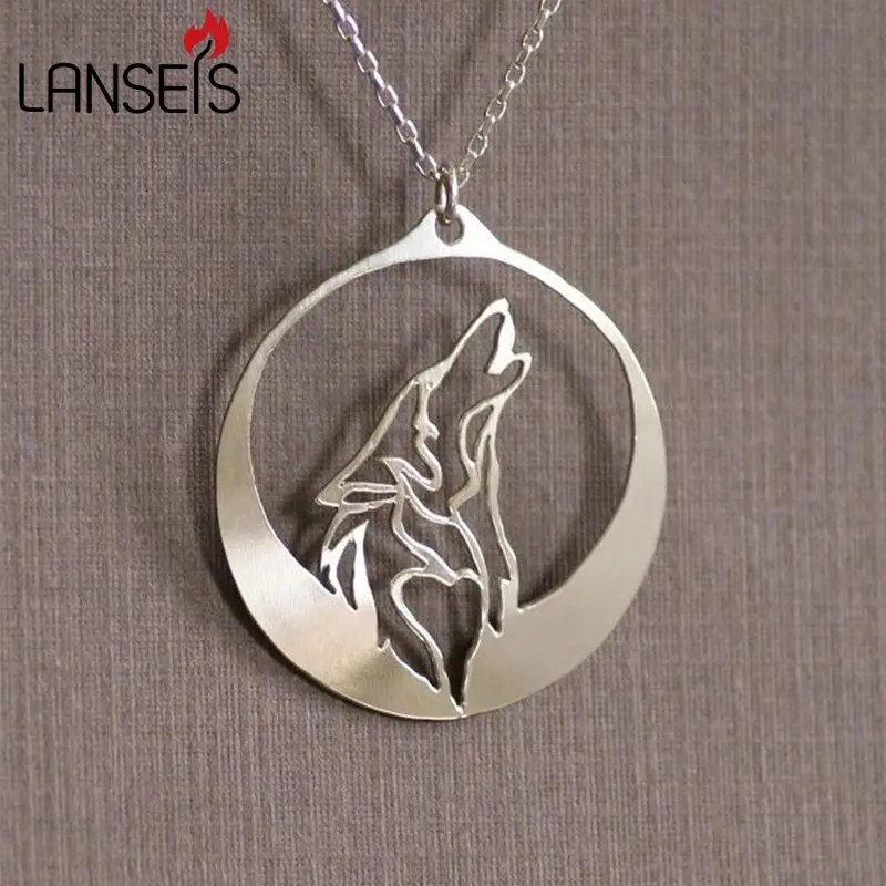 

lanseis10pc Howling Wolf necklace pendant wolf howls into the night as its profile is captured in the light of a moon