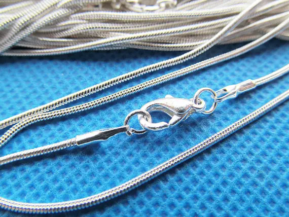 

Free Shipping 50pcs 16 Inch Hot Sale Luxury Unsex 1.20mm Silver Plated Snake Chain,Jewelry Necklaces,Snake Chain Necklace