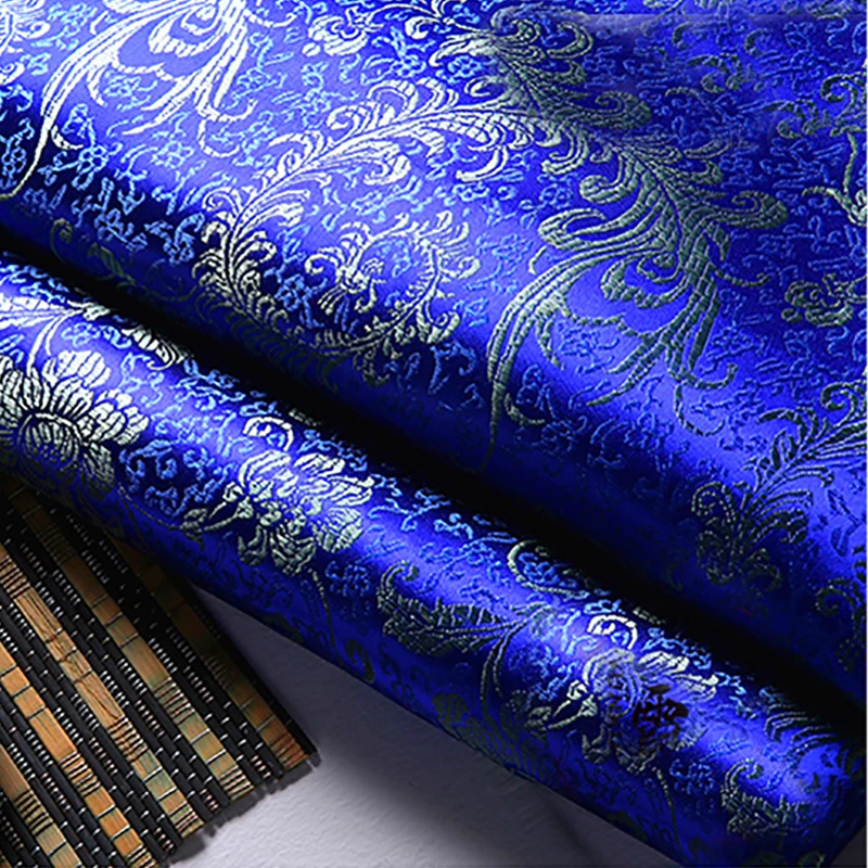 High quality brocade jacquard polyester blue background golden Phoenix Tail fabric for patchwork tissue women dress by 100x90