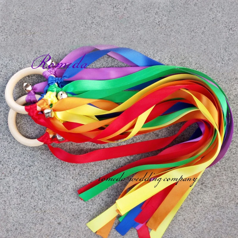 

Free Shipping Rainbow Color Stain ribbon Wooden Ring Waldorf Ribbon With Bell Hand Kite Toy FLY ME Birthday Party Favors