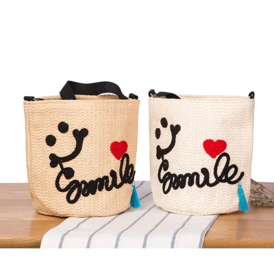 

New diagonal straw bag cute sweet smile plus letter fringe vacation beach bag national wind weaving bucket shoulder bag