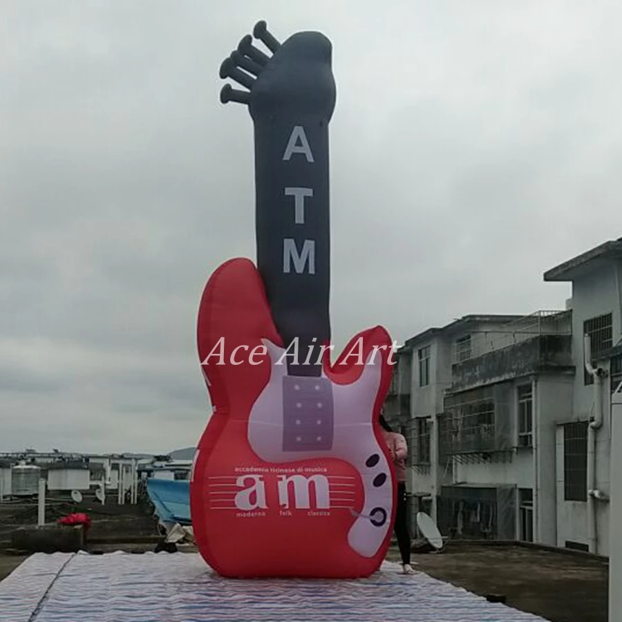 Custom giant inflatable electric Guitar with text offered by Ace Air Art