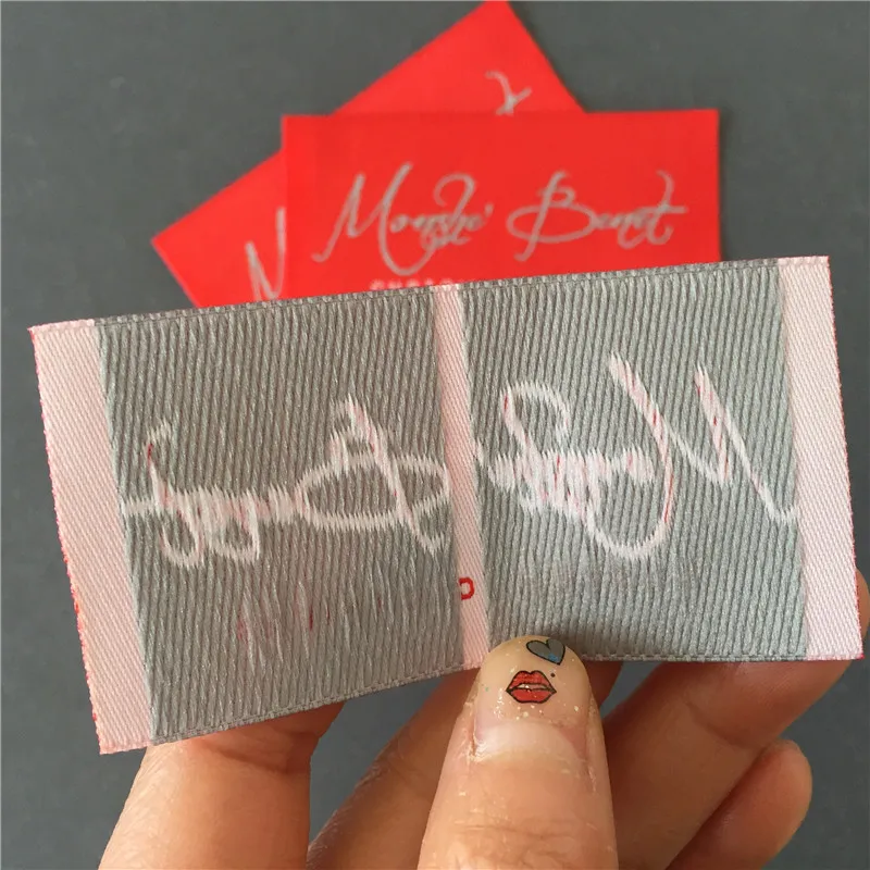 Customized 4*7.8cm Thick Cloth Straight Cutting Garment Woven Labels in Red Background with Grey Name and white letters