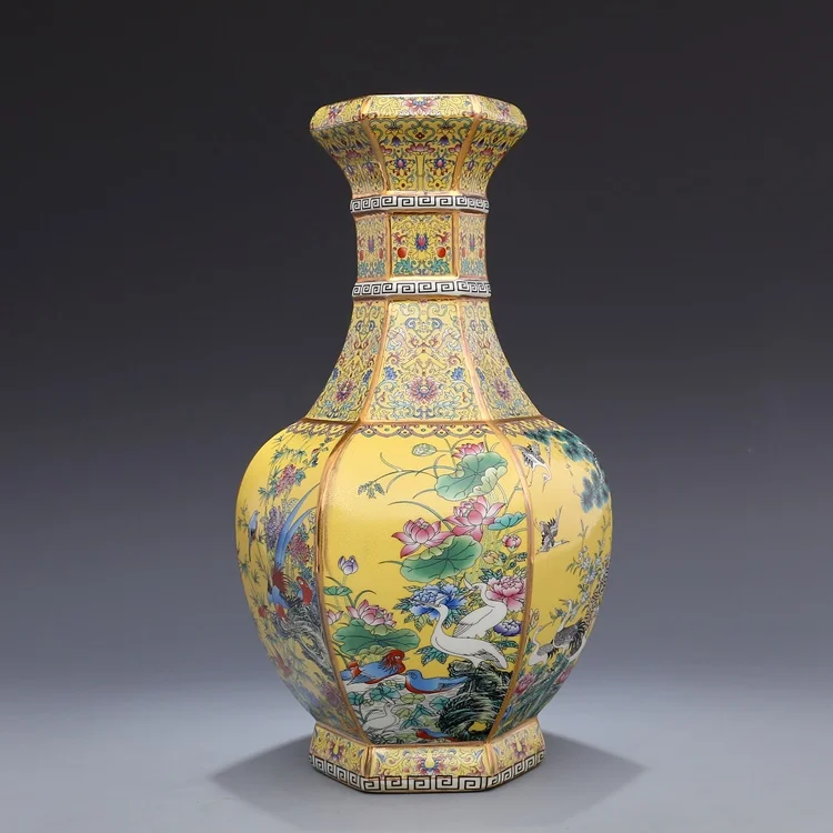 

Yong Zheng in the Qing Dynasty enamel yellow flower and bird vase hexagonal antique porcelain