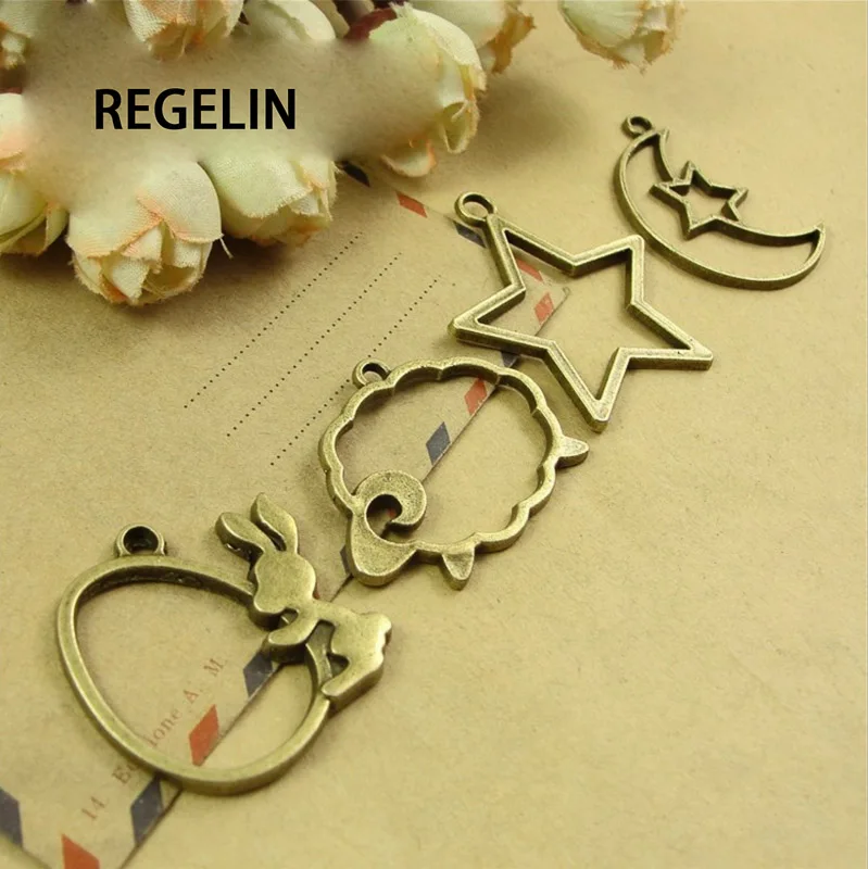 REGELIN 10pcs/lot animals Star shape UV Resin Charm magic bar Metal Frame Pendant Gold Charm Bezel Setting Cabochon Setting