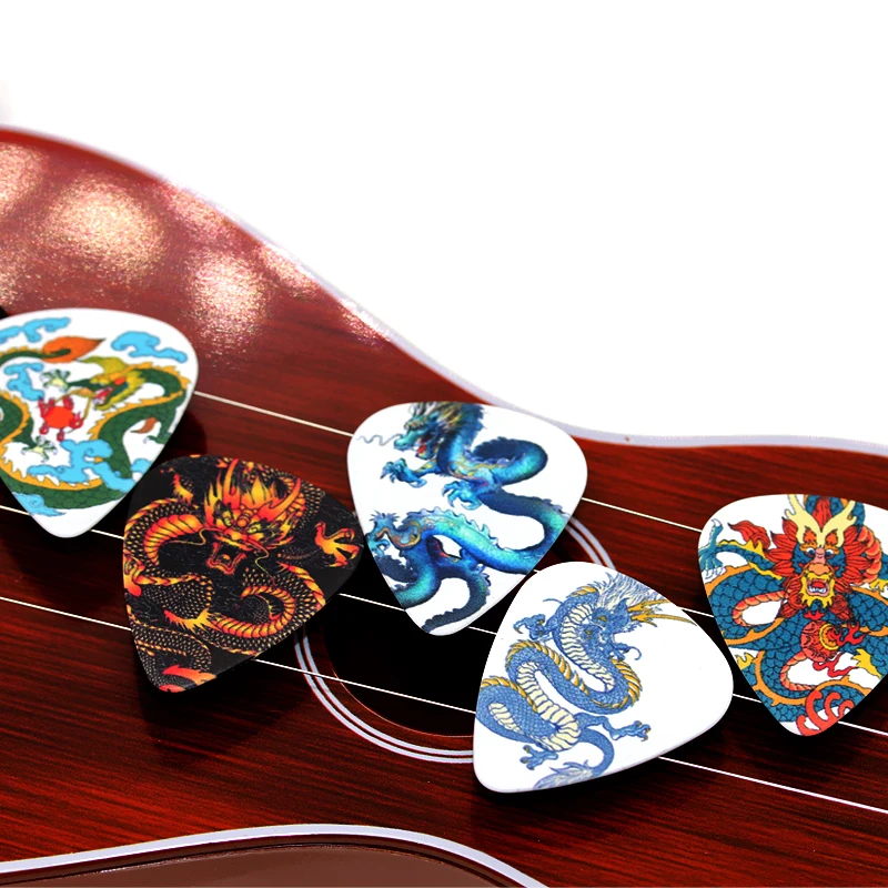 SOACH 10pcs/Lot 1.0mm thickness guitar strap guitar parts cool Dragon design guitar picks pick