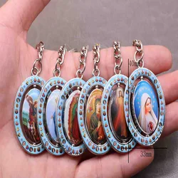 Hot Jesus oval rotating keychain. Michael Angel, Blue Mary, Merciful Jesus, Virgin Guadalupe, etc. Image Keychain