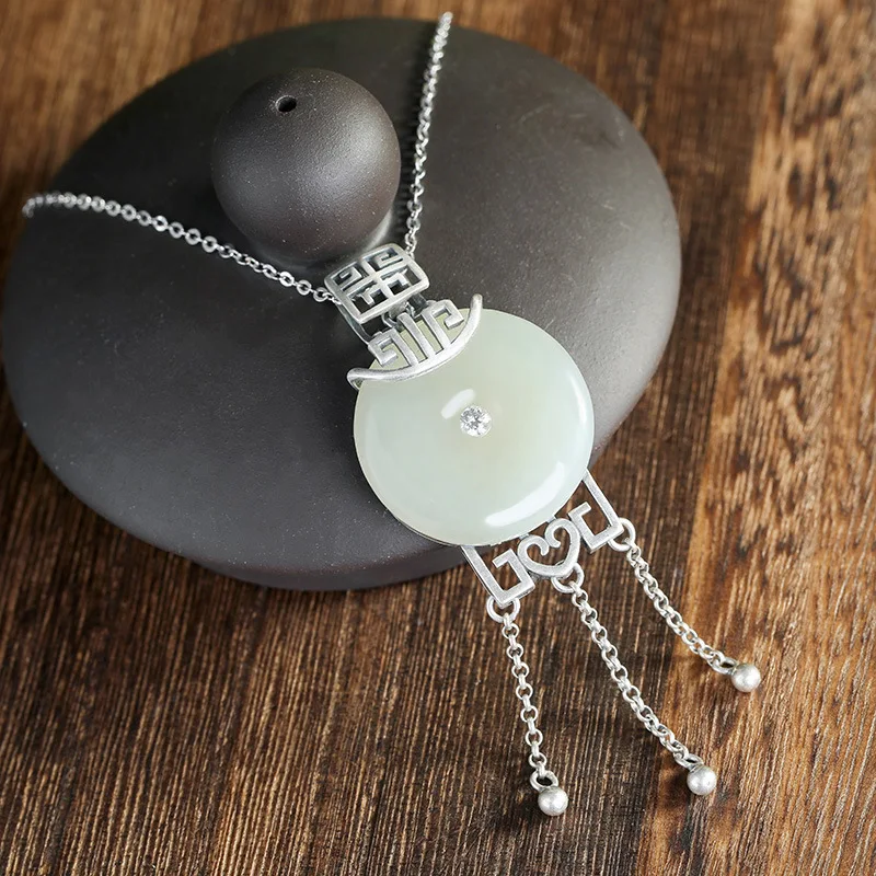 

pure silver inlay hetian jade white jade peace buckle meditate on the tassel female high-grade natural necklace pendant