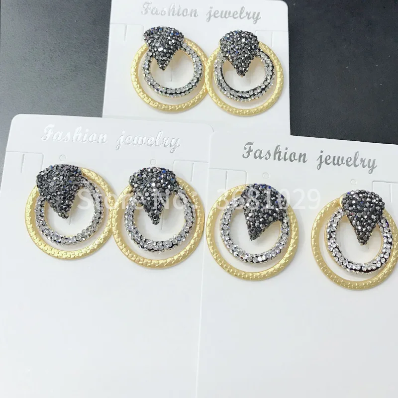 

Shining rhinestones hollowed-out circular cascade earrings with stylish black and gold colored earrings