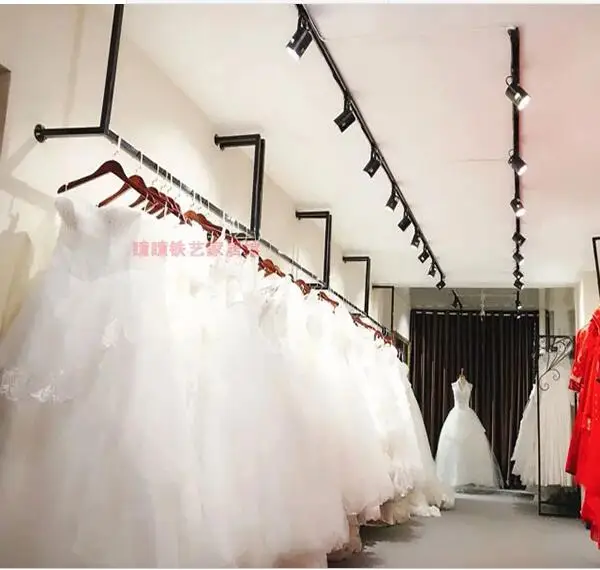 

Tieyi wedding rack hanging high-grade display rack wedding dress shop dress hangers on the wall u-shaped clothing rack ceiling.