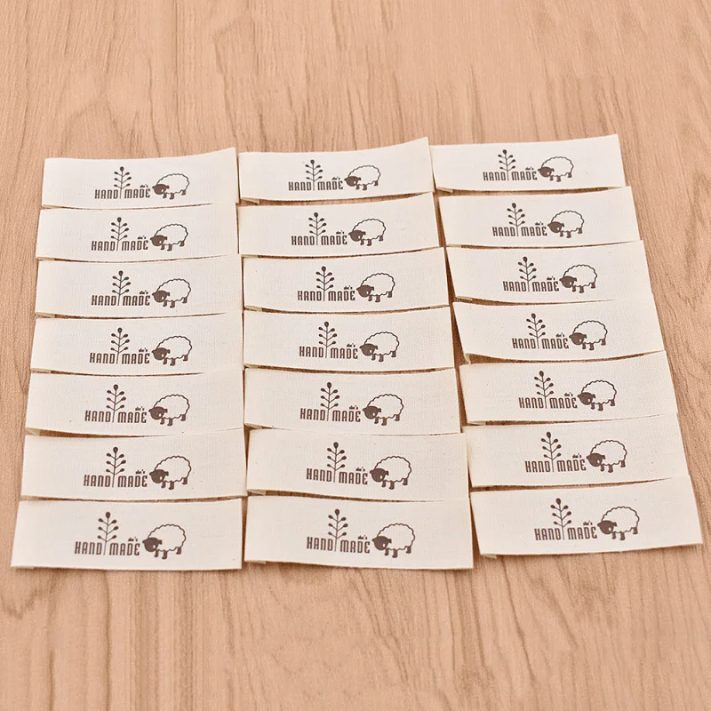 50PCS/pack Cartoon Sheep Needlework Pattern Washable Garment Labels DIY Handmade Craft Bag Hat Sewing On Cloth Tags