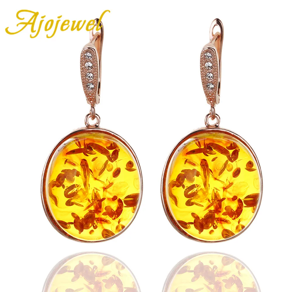

Ajojewel Women's Big Stud Earrings With Orange Stone Shiny Rose Gold Color Jewelry Beauty Gift