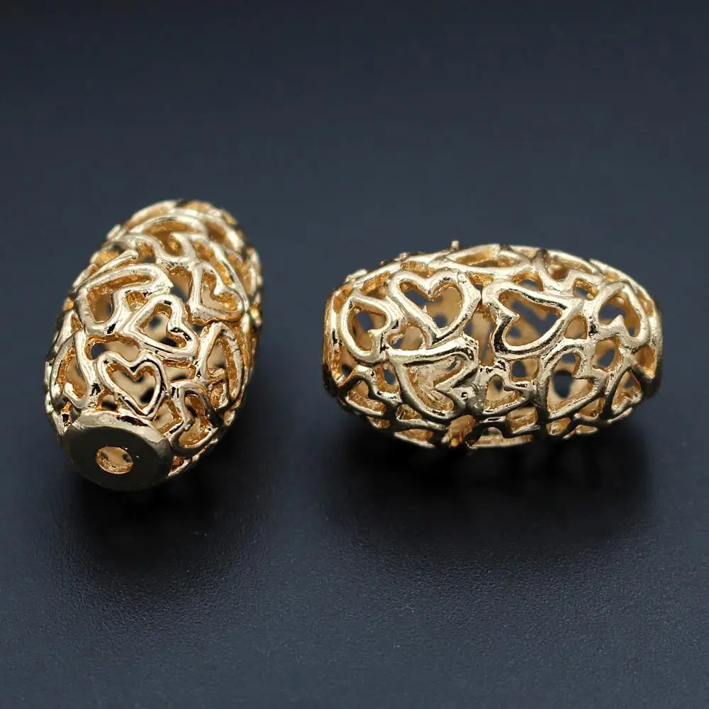 

Spacer Beads Filigree Metal Heart Bead Oval Drum Connector Beads DIY Jewelry Accessories for African Earrings Necklace Making